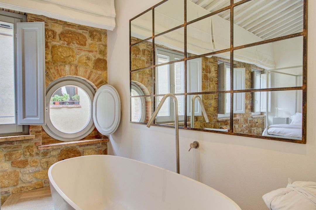 Luxury Hotel Bathroom Open Bathtub, modernity, exposed brick wall | Studio Archiloop: Architects of Amazing Heritage Hotels in Italy 