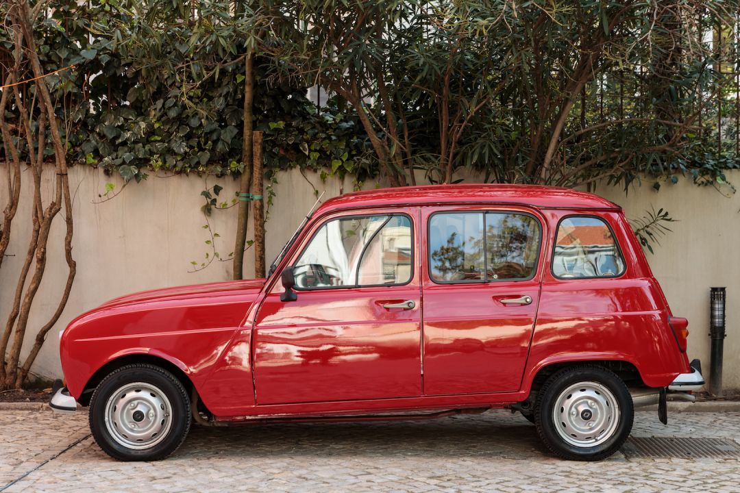 The Red Renault Vintage Car | Palacio Principe Real | Luxury Boutique Hotel Lisbon | The Aficionados