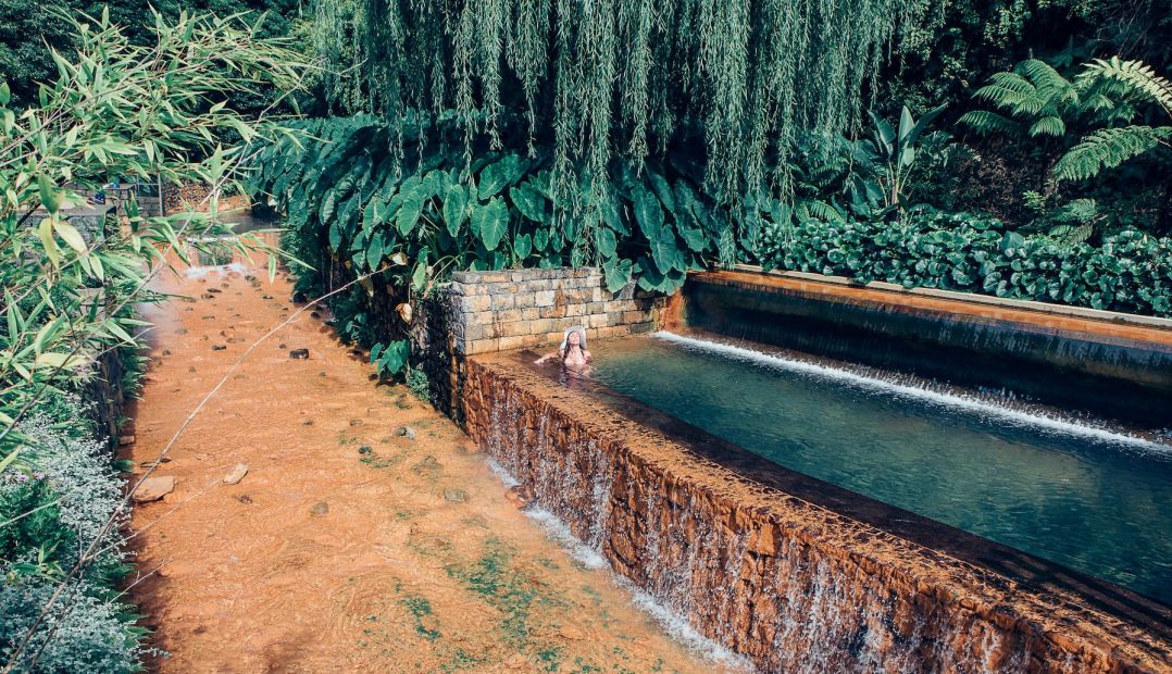 Photograph of the architectural masterpiece that is São Miguel’s Poça da Dona Beija thermal spring in the Azores