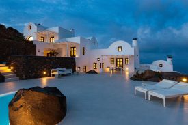 Cycladic archtitecture on Santorini, black on white, typical roof tops at Aenaon Villas Caldera 