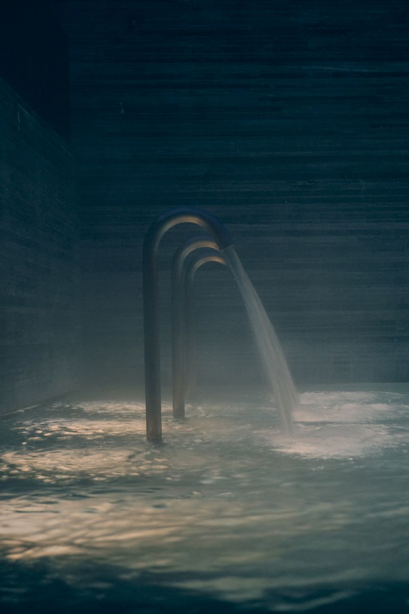 Interior pool of Peter Zumthor’s Therme Vals architecture, slate walls 